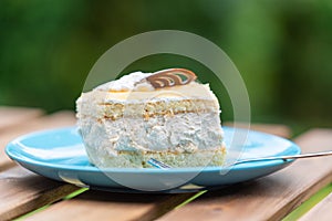 Cream nut cuts on a plate with a fork