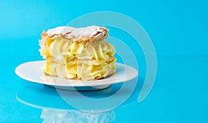 Cream pie slice on a white plate