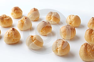 cream puffs aligned isolated on white background