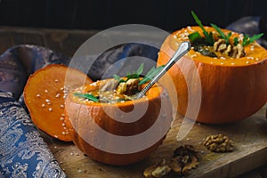 Cream of pumpkin soup with nuts photo