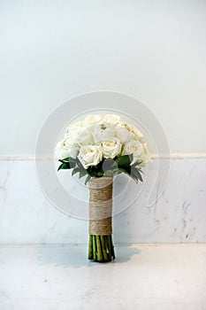 Cream roses wedding bouquet of the bride and bridesmaids