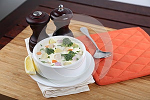 Cream Vegetable With Chicken Soup served in a bowl isolated on table side view of middle east food