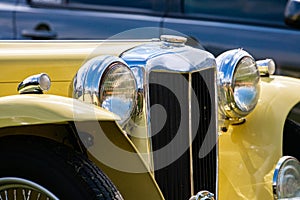 Cream white classic antique car front