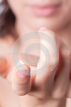 Cream on the women hand