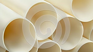 Creamcolored PVC pipe with a velvety texture and smooth rounded edges photo