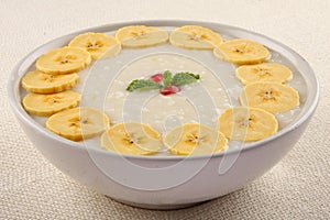 Creamed organic rice pudding with bananas.