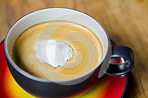 Creamer on a cup of coffee