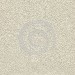 Creamy, beige, light textured leather background for design.