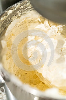 Creamy Buttercream Frosting Whipped in Stand Mixer Bowl