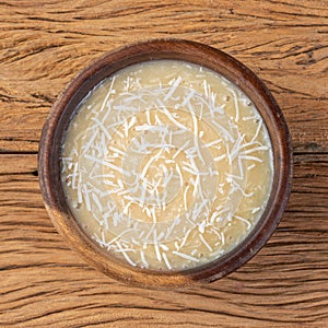 Creamy cocada, traditional brazilian coconut candy with grated coconut