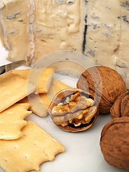 Creamy gorgonzola cheese, nuts, and biscuits photo