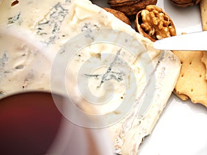 Creamy gorgonzola cheese, nuts, and biscuits photo