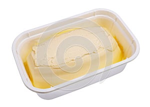 Creamy margarine in an industrial plastic container isolated