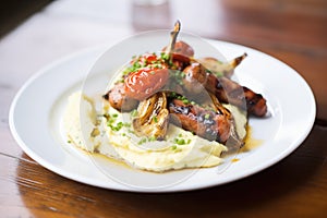 creamy mash with perfectly grilled bangers on top