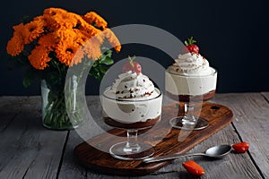Creamy mousse showcased on kitchen table, a sweet delight