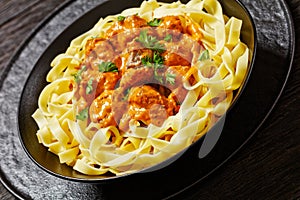 Creamy Paprika Pork Chunks over tagliatelle noodle