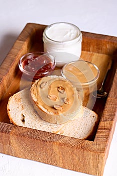Creamy peanut butter on a slice of toast. Peanut butter sandwich