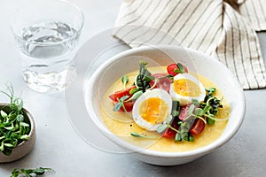 creamy polenta with eggs. Italian cuisine