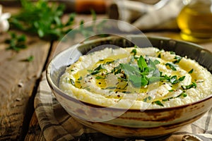 creamy polenta garnished with fresh herbs and a drizzle of olive oil