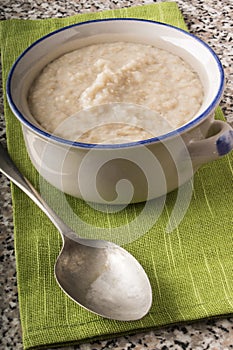 Creamy porridge made with traditional irish oatmeal in a bowl