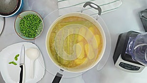 Creamy pureed celery soup step by step recipe. Close up video, woman hands