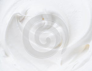 Creamy yoghurt swirled round close-up