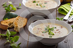 Creamy zucchini soup with chilli and oregano