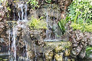 Create a decorative waterfall in the garden