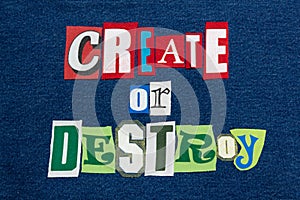 CREATE OR DESTROY text word collage colorful fabric on denim, encourage or discourage