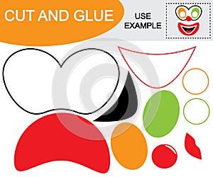 Create the image of face of clown using scissors and glue.