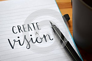 CREATE A VISION hand-lettered in notebook