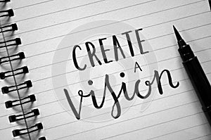 CREATE A VISION hand-lettered in notebook