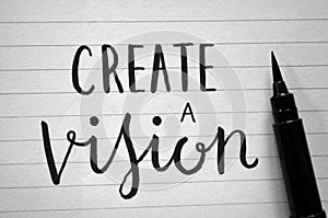 CREATE A VISION hand-lettered in notebook