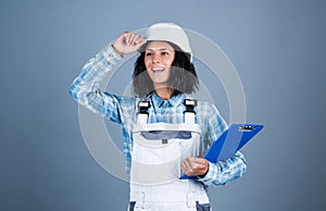 Create your dream home. mechanic girl in hardhat. building and construction. professional manual worker. technician
