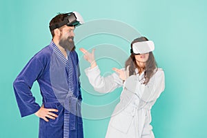 Create your reality. world of immagination. family couple wear vr glasses. girl and man hipster relax in bathrobe