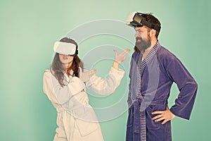 Create your reality. world of immagination. family couple wear vr glasses. girl and man hipster relax in bathrobe