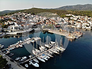 Port with boats in Neos Marmaras, Sithonia, Greece photo