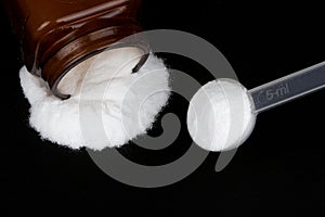 Creatine monohydrate on black background