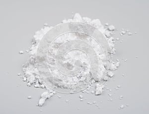 Creatine Powder on light grey background