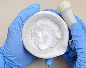 Creatine Powder on light grey background