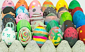 Creating art on eggs for Easter.