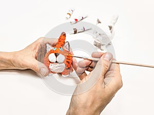 Creating a handmade toy. Cheerful wadding toy cats by handmade