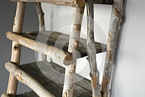 creating shelves from rustic wooden ladders