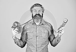 Creating unique ideas. Businessman touts retro phone. Retro customer service. communication. Man talking to vintage