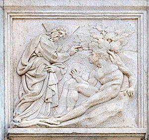 Creation of Adam, Genesis relief on portal of St Petronius Basilica in Bologna, Italy