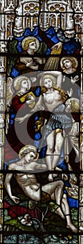 Creation of Eve in stained glass