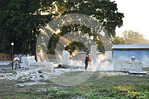 Creation of monuments. sculptors creating sculptures photo