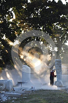 Creation of monuments. sculptors creating sculptures photo