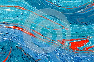 Creative abstract art background in blue tones with red lines and spots.