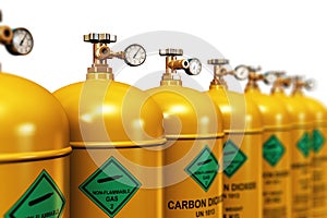 Row of liquefied carbon dioxide industrial gas containers photo